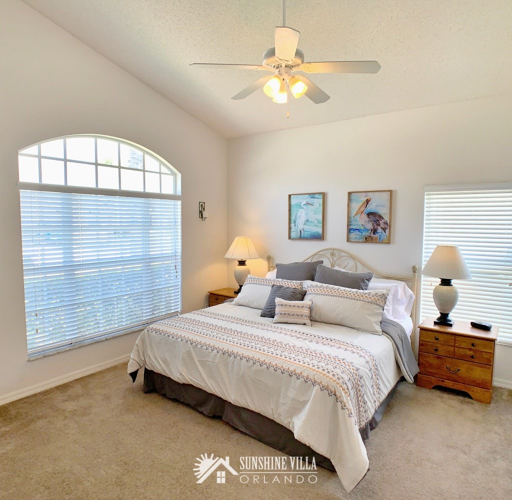 A second master bedroom with a king sized bed and ensuite private bathroom at Sunshine Villa at Glenbrook Resort, a short-term vacation rental home in Orlando near Walt Disney World