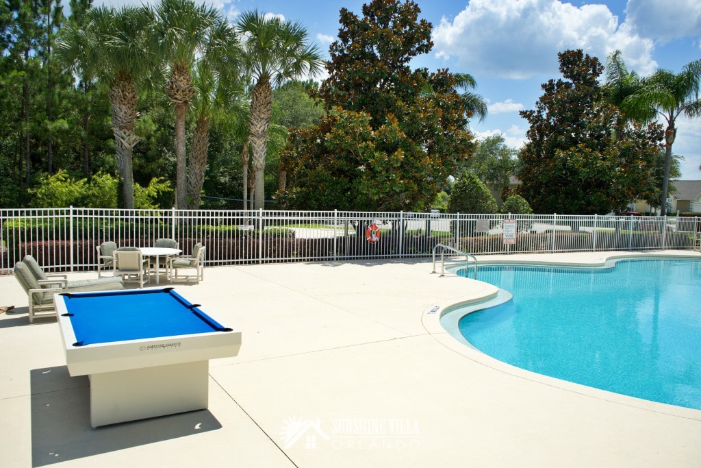 Community Pool and Outdoor Pool Table in Glenbrook Resort in Clermont, Florida near Orlando