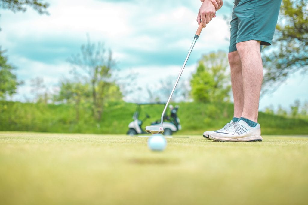 A man golfing in Florida