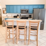 Kitchen Island with 3 Bar Stools at Sunshine Villa at Glenbrook Resort